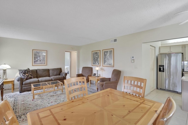 331 Knotty Pine Cir Unit C-1, Greenacres, FL 33463 - living room featuring light tile patterned floors and a textured ceiling