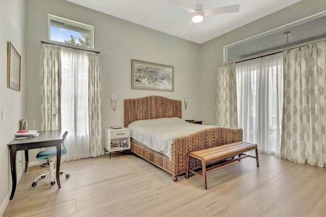 2703 SW Glenmoor Way, Palm City, FL 34990 - bedroom with wood finished floors and ceiling fan