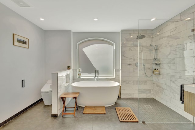 2703 SW Glenmoor Way, Palm City, FL 34990 - full bath featuring walk in shower, a freestanding bath, toilet, and recessed lighting