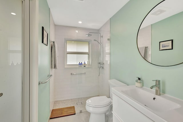 2703 SW Glenmoor Way, Palm City, FL 34990 - bathroom featuring a shower stall, vanity, toilet, and tile patterned floors