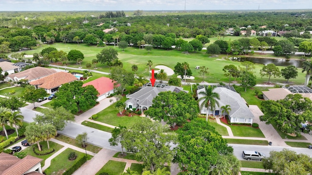 2703 SW Glenmoor Way, Palm City, FL 34990 - aerial view of residential area featuring a local golf course and a nearby body of water