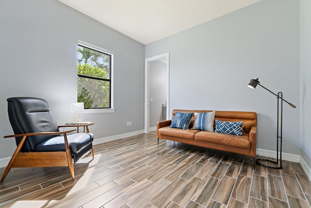 515 Sonoma Isles Cir, Jupiter, FL 33478 - sitting room with baseboards and wood finish floors