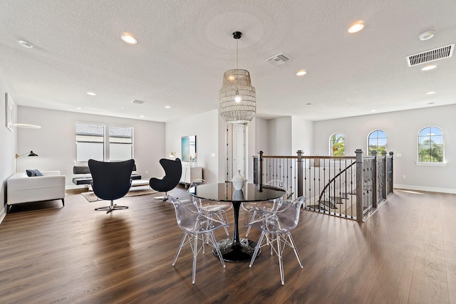 515 Sonoma Isles Cir, Jupiter, FL 33478 - dining room featuring dark wood finished floors, a textured ceiling, recessed lighting, and baseboards