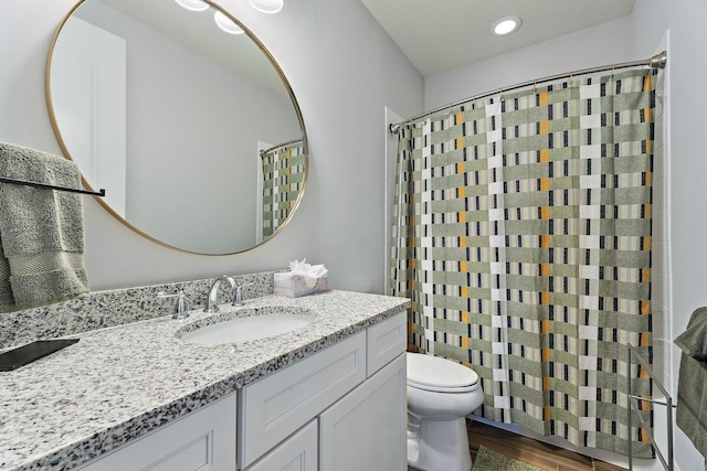 515 Sonoma Isles Cir, Jupiter, FL 33478 - bathroom with vanity, toilet, wood finished floors, curtained shower, and recessed lighting