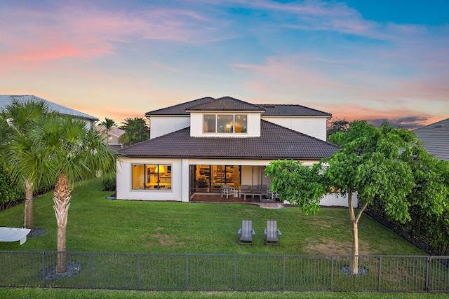 515 Sonoma Isles Cir, Jupiter, FL 33478 - back of house featuring a tile roof, stucco siding, and a patio