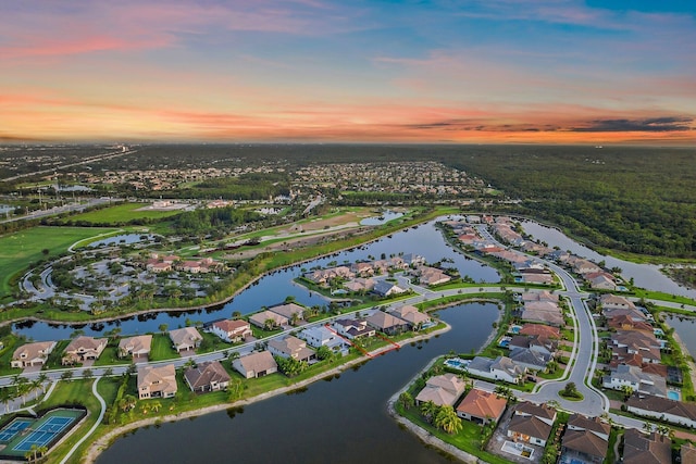 515 Sonoma Isles Cir, Jupiter, FL 33478 - aerial view at dusk of a residential view and a water view