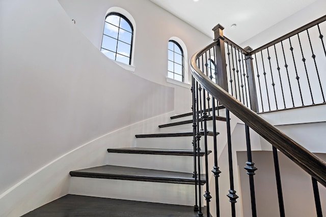 515 Sonoma Isles Cir, Jupiter, FL 33478 - stairs with a towering ceiling and wood finished floors