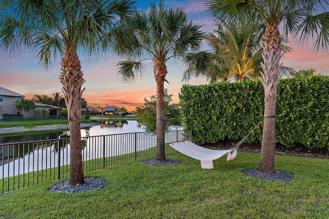 515 Sonoma Isles Cir, Jupiter, FL 33478 - yard at dusk with a water view