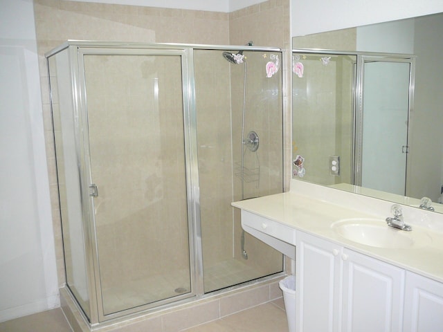1840 E Sanderling Ln Unit 1, Fort Pierce, FL 34982 - bathroom with a shower stall, vanity, tile patterned floors, and toilet