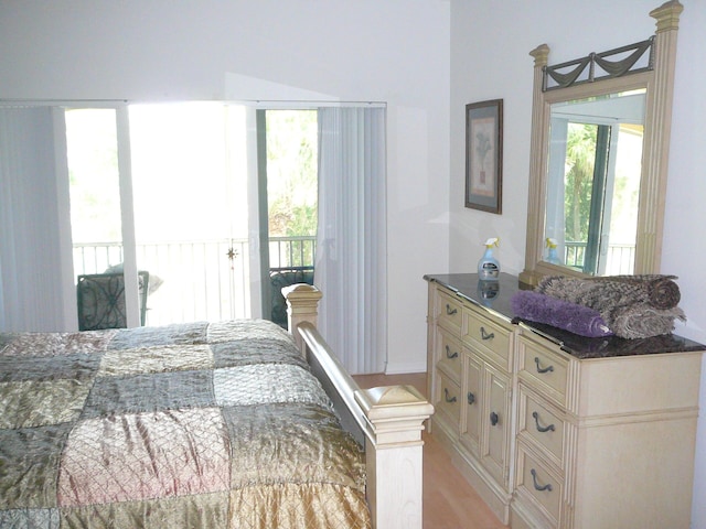 1840 E Sanderling Ln Unit 1, Fort Pierce, FL 34982 - bedroom featuring access to outside and light wood finished floors