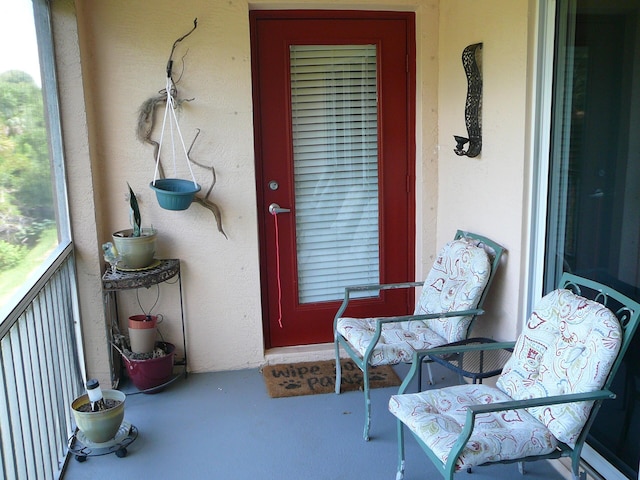 1840 E Sanderling Ln Unit 1, Fort Pierce, FL 34982 - doorway to property with stucco siding