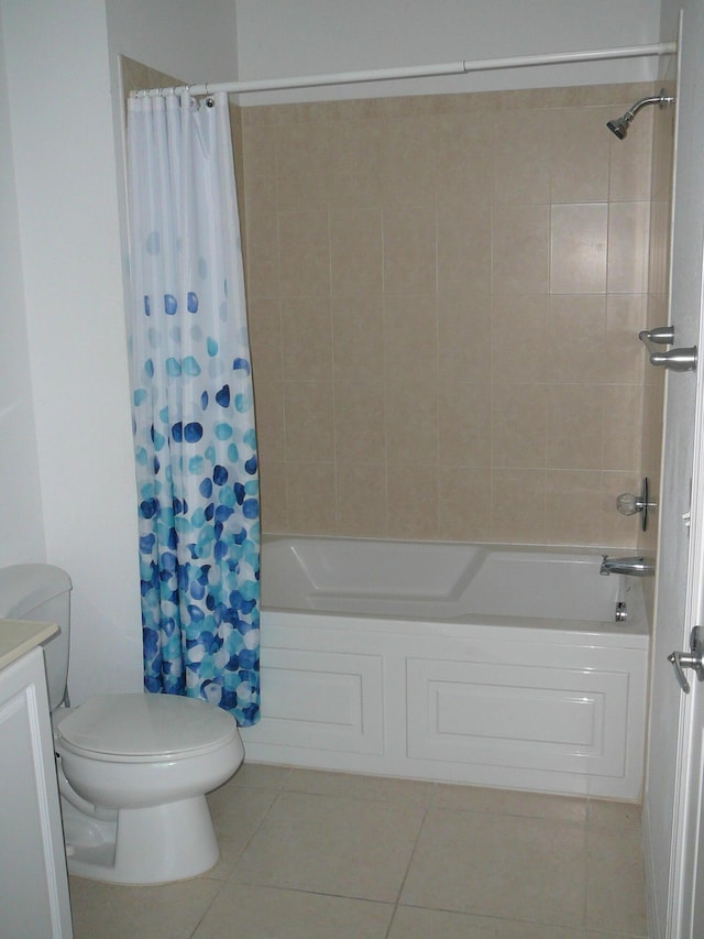 1840 E Sanderling Ln Unit 1, Fort Pierce, FL 34982 - bathroom featuring tile patterned flooring, shower / tub combo, vanity, and toilet