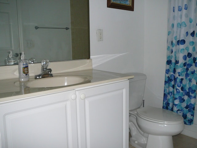 1840 E Sanderling Ln Unit 1, Fort Pierce, FL 34982 - full bathroom with vanity, toilet, and a shower with shower curtain