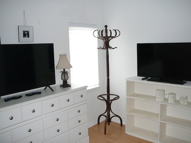 1840 E Sanderling Ln Unit 1, Fort Pierce, FL 34982 - living area with light wood-style floors and baseboards