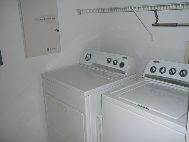 1840 E Sanderling Ln Unit 1, Fort Pierce, FL 34982 - washroom with washer and clothes dryer