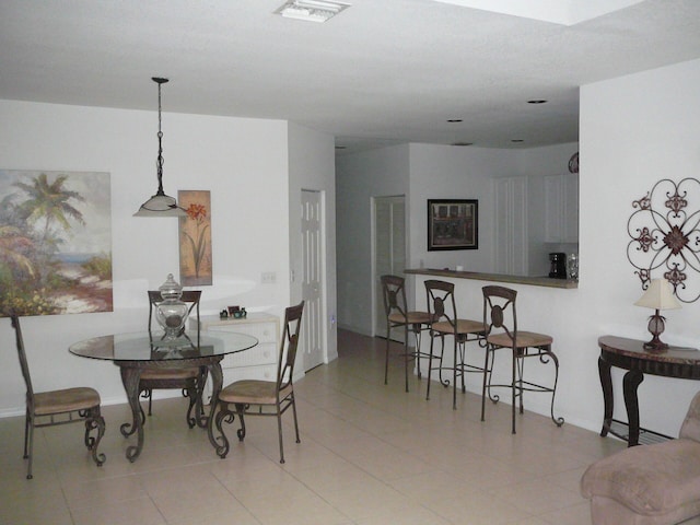 1840 E Sanderling Ln Unit 1, Fort Pierce, FL 34982 - dining room with light tile patterned flooring
