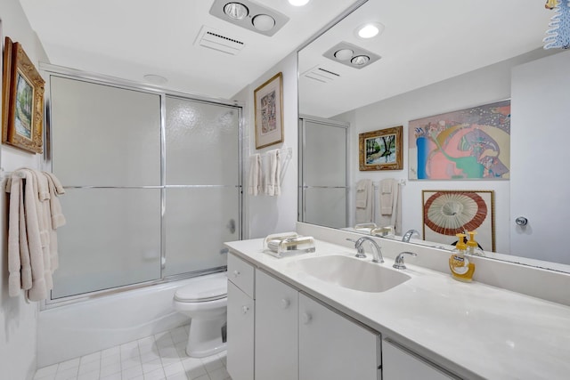 3300 S Ocean Blvd Unit 103S, Palm Beach, FL 33480 - bathroom with toilet, vanity, bath / shower combo with glass door, and tile patterned floors
