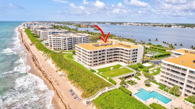 3300 S Ocean Blvd Unit 103S, Palm Beach, FL 33480 - drone / aerial view of apartment complex, expansive coastline, and a pool