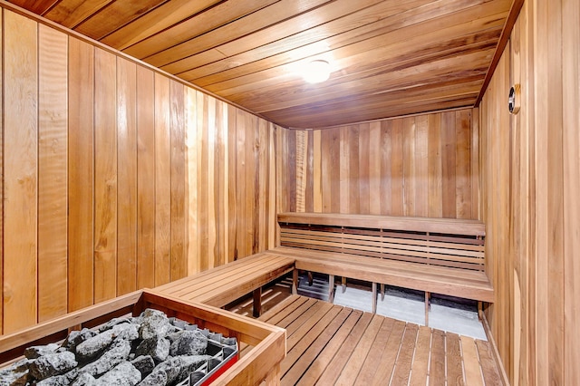 3300 S Ocean Blvd Unit 103S, Palm Beach, FL 33480 - sauna / steam room featuring wood walls, wooden ceiling, and hardwood / wood-style flooring