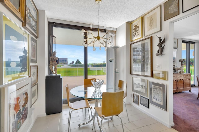 3300 S Ocean Blvd Unit 103S, Palm Beach, FL 33480 - dining room with a chandelier, light tile patterned floors, baseboards, and a textured ceiling