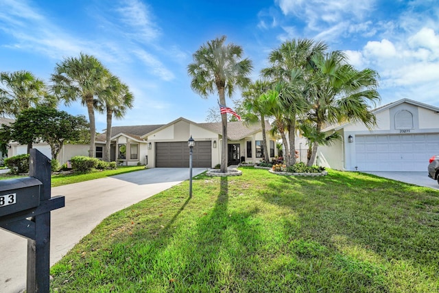 23283 Boca Trace Dr, Boca Raton, FL 33433 - ranch-style house featuring a garage, a front yard, driveway, and stucco siding