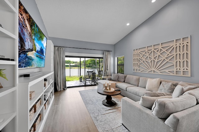 23283 Boca Trace Dr, Boca Raton, FL 33433 - living room featuring high vaulted ceiling, recessed lighting, and wood finished floors