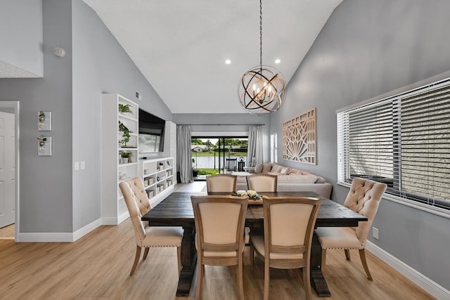 23283 Boca Trace Dr, Boca Raton, FL 33433 - dining area with high vaulted ceiling, light wood-style floors, baseboards, a chandelier, and recessed lighting