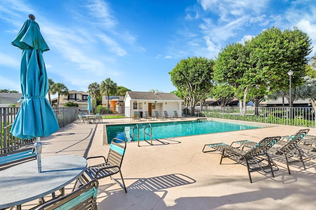 23283 Boca Trace Dr, Boca Raton, FL 33433 - community pool with a patio area