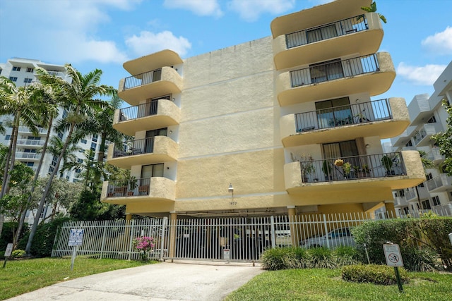 1673 Bay Rd Unit 206, Miami Beach, FL 33139 - view of apartment building / complex with concrete driveway