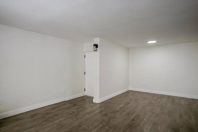 1673 Bay Rd Unit 206, Miami Beach, FL 33139 - empty room featuring dark wood-style flooring, baseboards, and recessed lighting