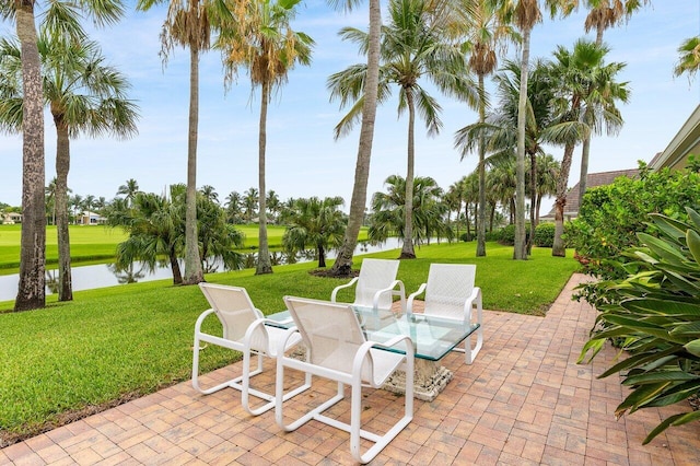 2150 SE Golfview Ln, Stuart, FL 34996 - view of patio featuring a water view