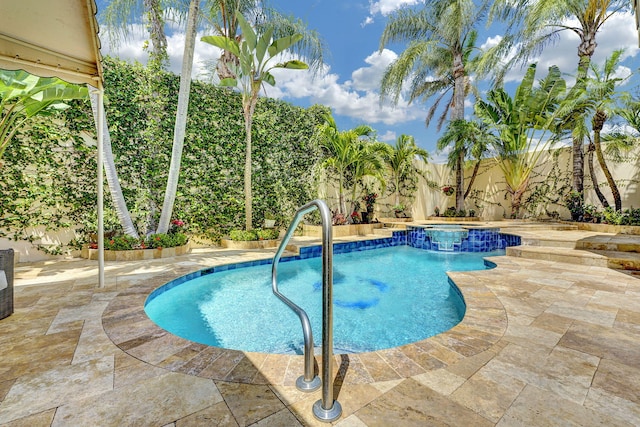 17233 Bermuda Village Dr, Boca Raton, FL 33487 - view of swimming pool with a fenced backyard, a patio, and an outdoor hot tub