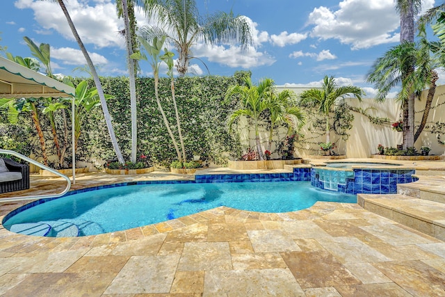 17233 Bermuda Village Dr, Boca Raton, FL 33487 - view of swimming pool featuring a fenced backyard, a pool with connected hot tub, and a patio