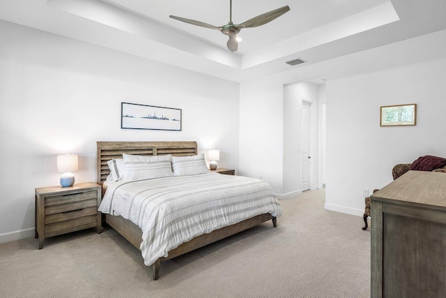 13487 Whistler Mountain Rd, Delray Beach, FL 33446 - bedroom with light carpet, a raised ceiling, baseboards, and ceiling fan