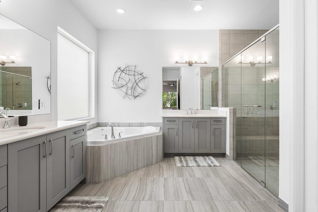 13487 Whistler Mountain Rd, Delray Beach, FL 33446 - full bath featuring two vanities, a shower stall, a bath, and recessed lighting