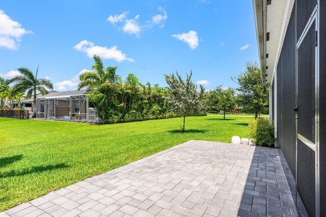 13487 Whistler Mountain Rd, Delray Beach, FL 33446 - view of patio / terrace with glass enclosure