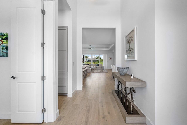 13487 Whistler Mountain Rd, Delray Beach, FL 33446 - hall with light wood-style floors and baseboards