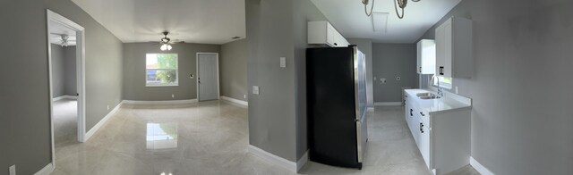324W W 5th Ter, Pahokee, FL 33476 - hall with a sink and baseboards