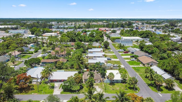 3044 SE Camino Ave, Stuart, FL 34997 - aerial view of property's location featuring nearby suburban area and a tree filled landscape