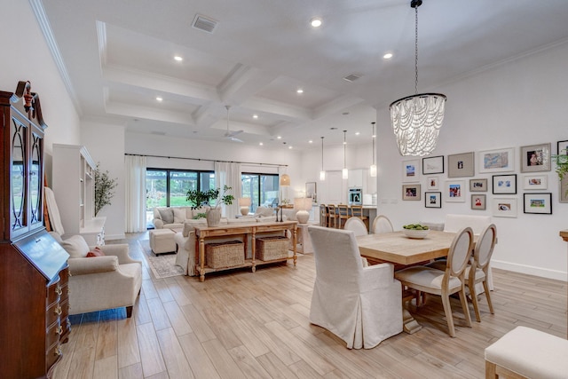 314 Sonoma Isles Cir, Jupiter, FL 33478 - dining area with a chandelier, beamed ceiling, coffered ceiling, light wood-style floors, and baseboards