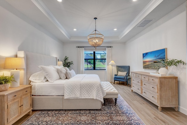 314 Sonoma Isles Cir, Jupiter, FL 33478 - bedroom featuring a tray ceiling, light wood-style floors, ornamental molding, a chandelier, and recessed lighting