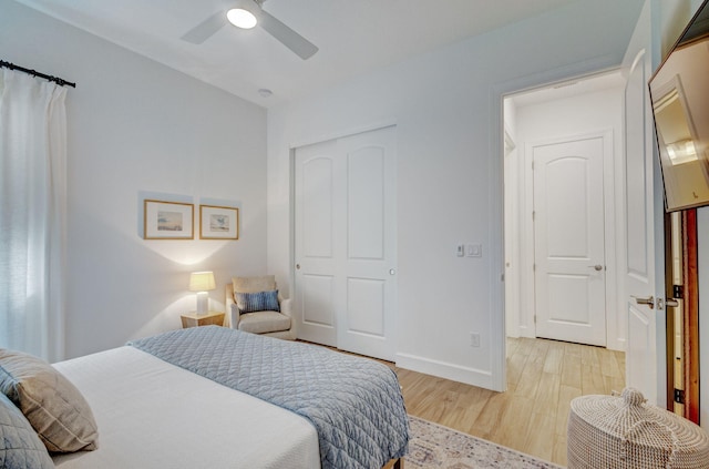 314 Sonoma Isles Cir, Jupiter, FL 33478 - bedroom with light wood-style floors, baseboards, and ceiling fan
