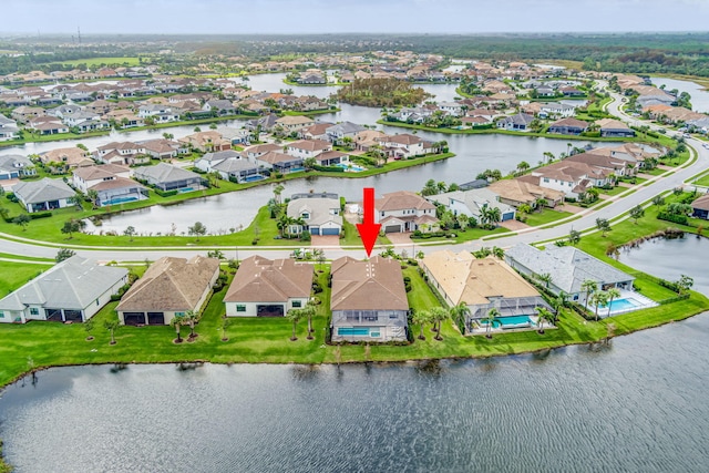 314 Sonoma Isles Cir, Jupiter, FL 33478 - aerial perspective of suburban area featuring a large body of water