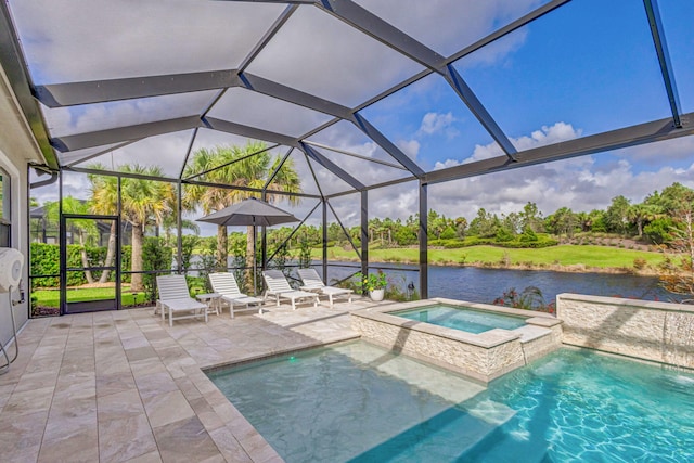 314 Sonoma Isles Cir, Jupiter, FL 33478 - view of pool with a water view, a patio area, glass enclosure, a pool with connected hot tub, and view of scattered trees