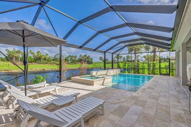314 Sonoma Isles Cir, Jupiter, FL 33478 - view of swimming pool featuring a water view, a patio, a pool with connected hot tub, and glass enclosure