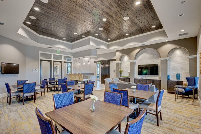 314 Sonoma Isles Cir, Jupiter, FL 33478 - dining room featuring a raised ceiling, light colored carpet, crown molding, recessed lighting, and baseboards