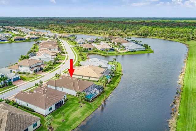 314 Sonoma Isles Cir, Jupiter, FL 33478 - aerial view of residential area with a heavily wooded area and a nearby body of water