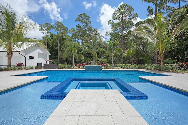 18072 127th Dr N, Jupiter, FL 33478 - view of pool with a pool with connected hot tub and a patio