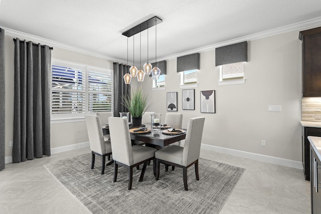 10339 SW Tetian Dr, Port Saint Lucie, FL 34987 - dining space with crown molding, a chandelier, and baseboards