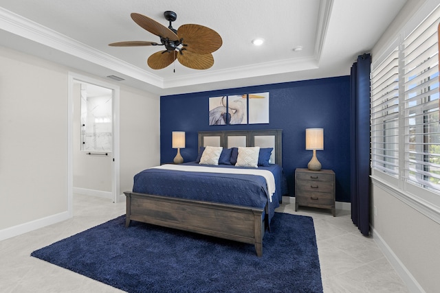10339 SW Tetian Dr, Port Saint Lucie, FL 34987 - tiled bedroom with a raised ceiling, ornamental molding, a ceiling fan, connected bathroom, and baseboards